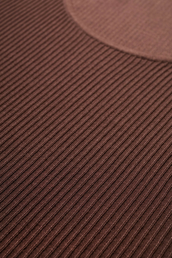 Celsius Knit T-Shirt in Cocoa Brown close up shot of fabric, ribbed with a shallow scoop neckline, small cap sleeves, and slim fit. Made from 100% Tencel. Available in 5 sizes. 