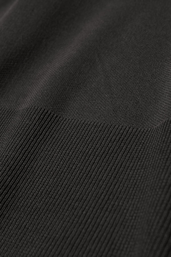 Close up fabric detail of the Clarity fitted crew-neck knit top in Black