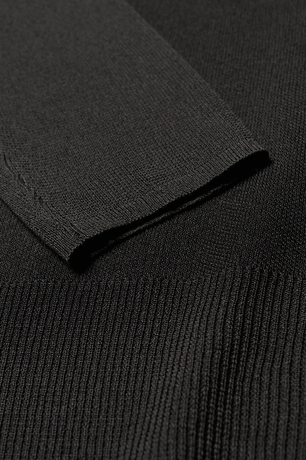 Close up fabric detail of the Clarity fitted crew-neck knit top in Black 