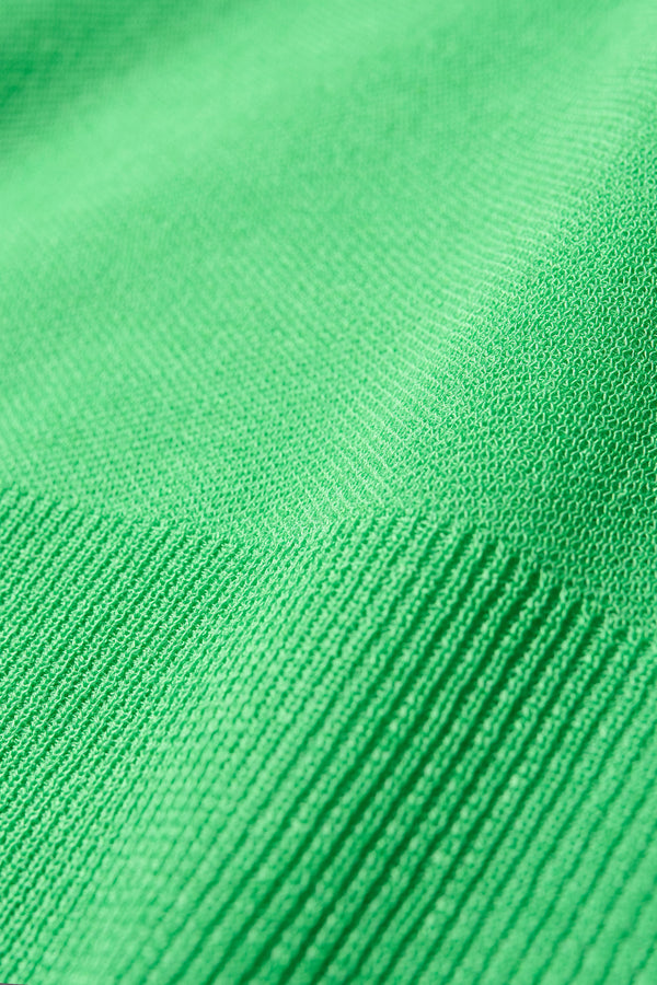 Close up fabric detail of the Clarity fitted crew-neck knit top in Vivid Green 
