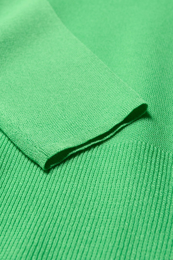 Close up fabric detail of the Clarity fitted crew-neck knit top in Vivid Green 