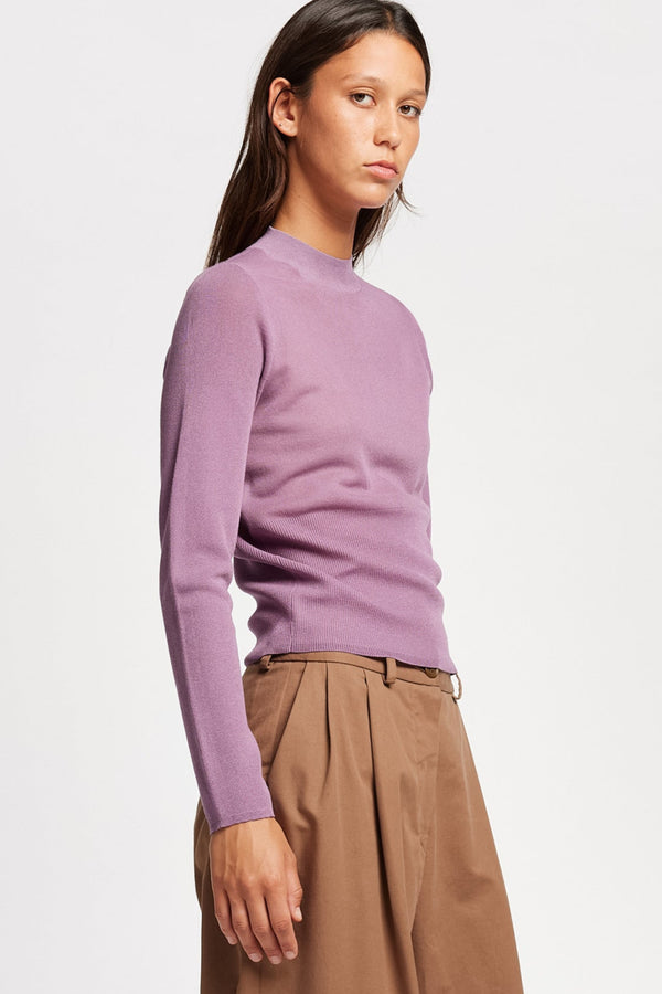 Front angle view on Model of the Clarity fitted crew-neck knit top in Mauve