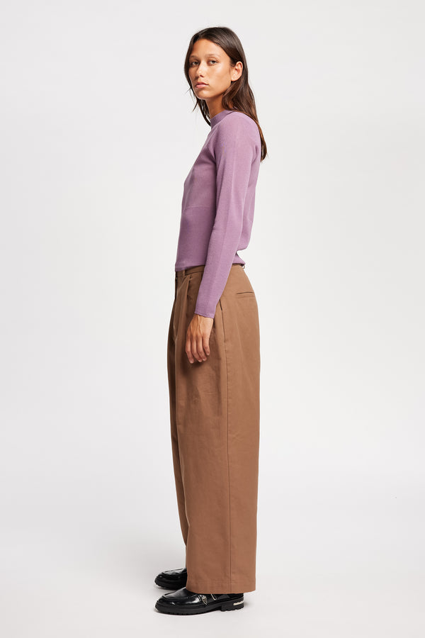 Side view on Model of the Clarity fitted crew-neck knit top in Mauve