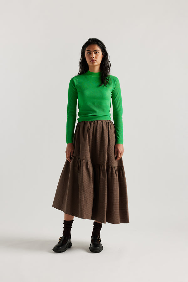 Front view on Model of the Clarity fitted crew-neck knit top in Vivid Green 