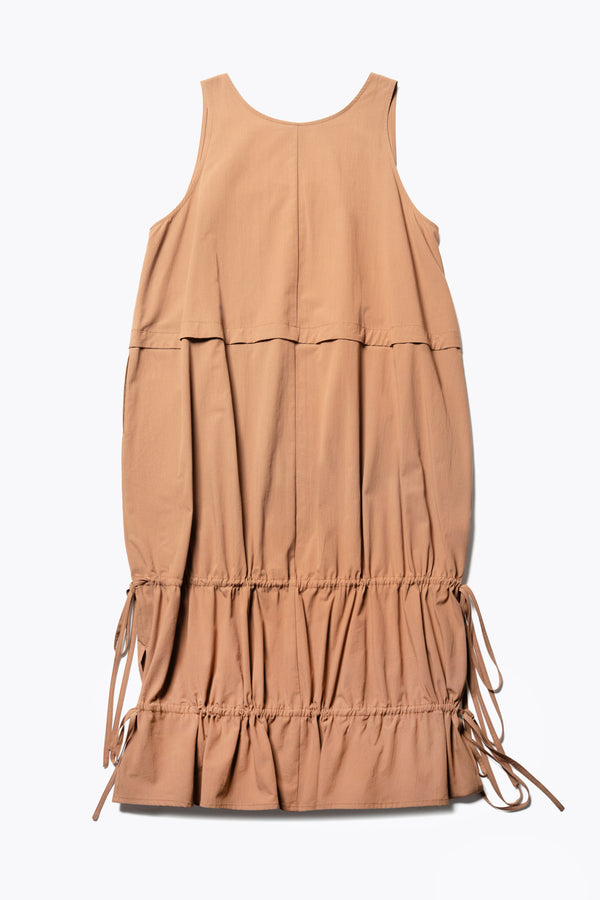 Flat back of the cloud dress in toffee brown, a relaxed-fit sleeveless dress with wide shoulder straps, a scoop neckline.