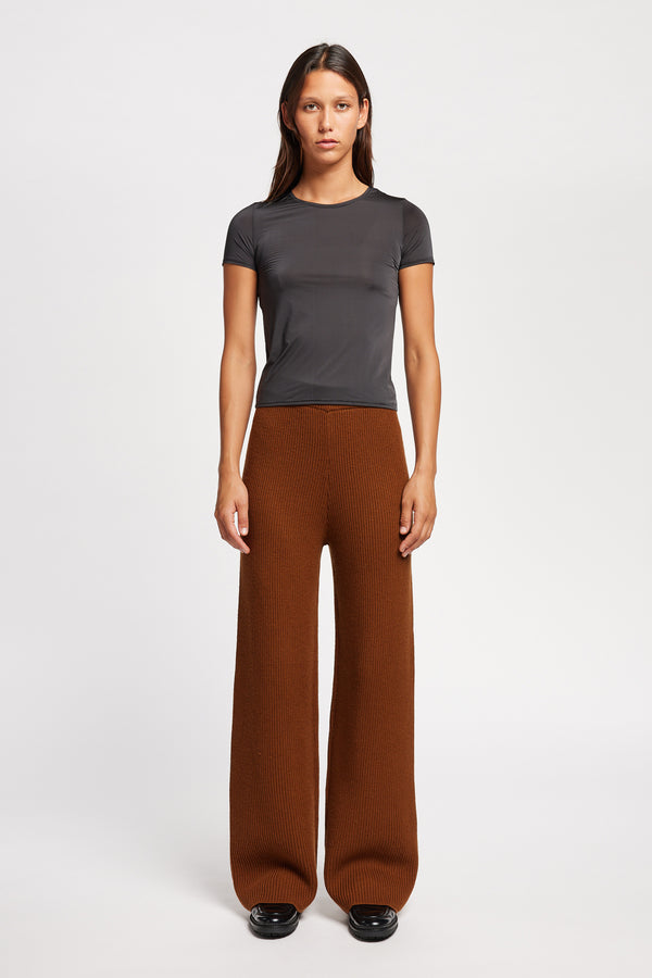 Front view on model of the Jet Black Convoy fitted short sleeve top with crew neckline, crafted in soft sheen recycled poly fabric