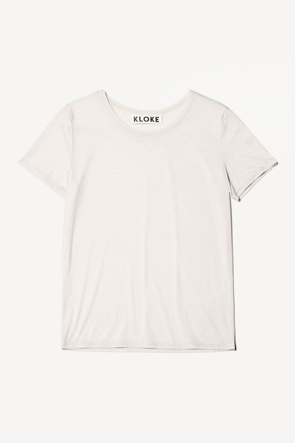 Flat front of the off white Convoy fitted short sleeve top with crew neckline, crafted in soft sheen recycled poly fabric