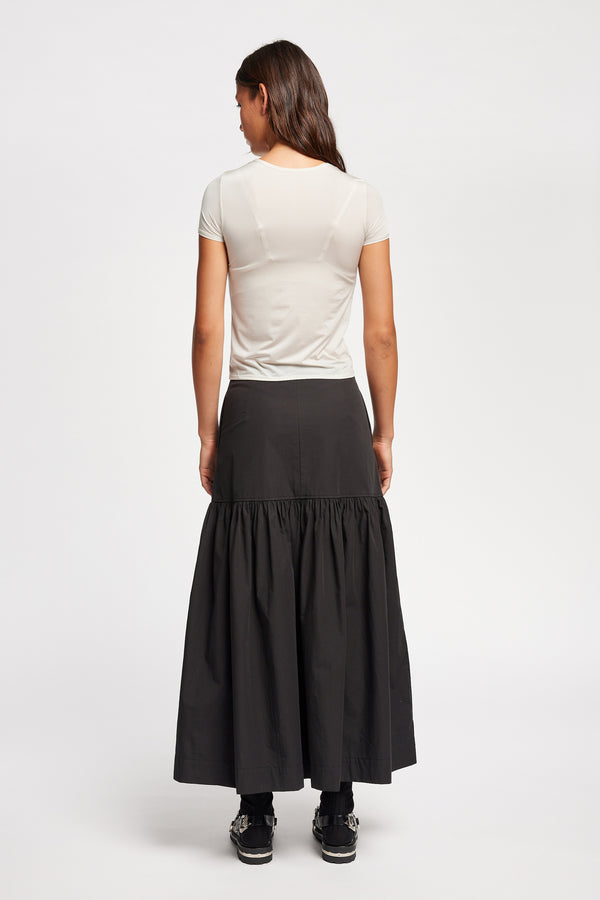 Back view on model of the off white Convoy fitted short sleeve top with crew neckline, crafted in soft sheen recycled poly fabric