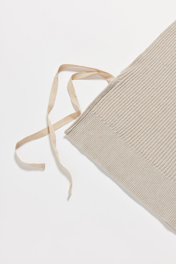 Close-up of Cusp Knit Vest showing herringbone tie and half-cardigan stitch texture.