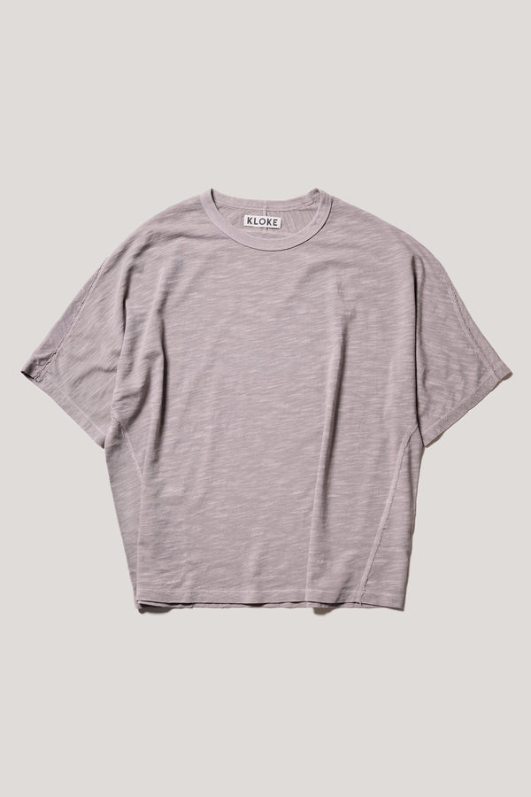 Flat Front of the Mauve Declare Tee in pigment-dyed slub cotton with relaxed boxy fit 