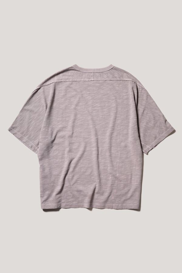 Flat Back of the Mauve Declare Tee in pigment-dyed slub cotton with relaxed boxy fit - highlighting the overlocked seam detailing. 