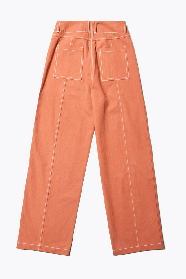 Back of the Delta pant in Burnt Orange, a tailored casual pant in premium cotton herringbone twill with contrast stitch panelling. Straight leg and tailored fit for a sleek, flattering polished finish. Available in 6 sizes. 