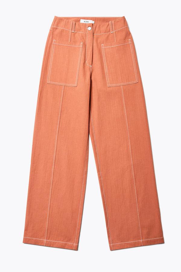 Delta pant in Burnt Orange, a tailored casual pant in premium cotton herringbone twill with contrast stitch panelling. Straight leg and tailored fit for a sleek, flattering polished finish. Available in 6 sizes. 