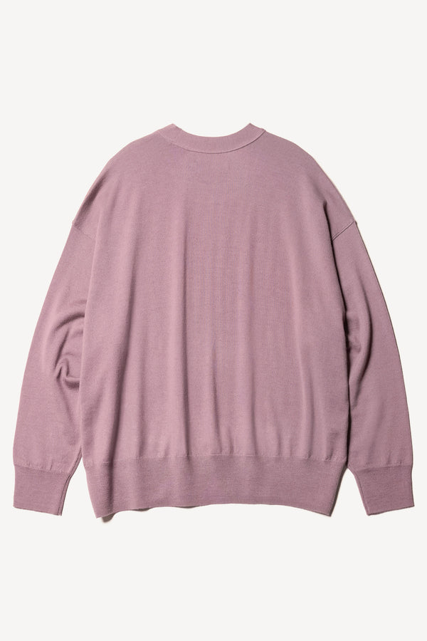 Flat back shot of the Descend loose fit merino knit in Mauve 