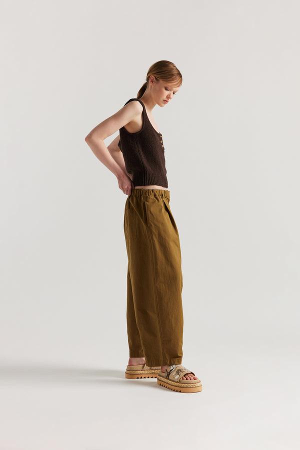 Side of Model in the Brown Ether Rib Tank with wide straps, scoop neckline and three-button front detail.