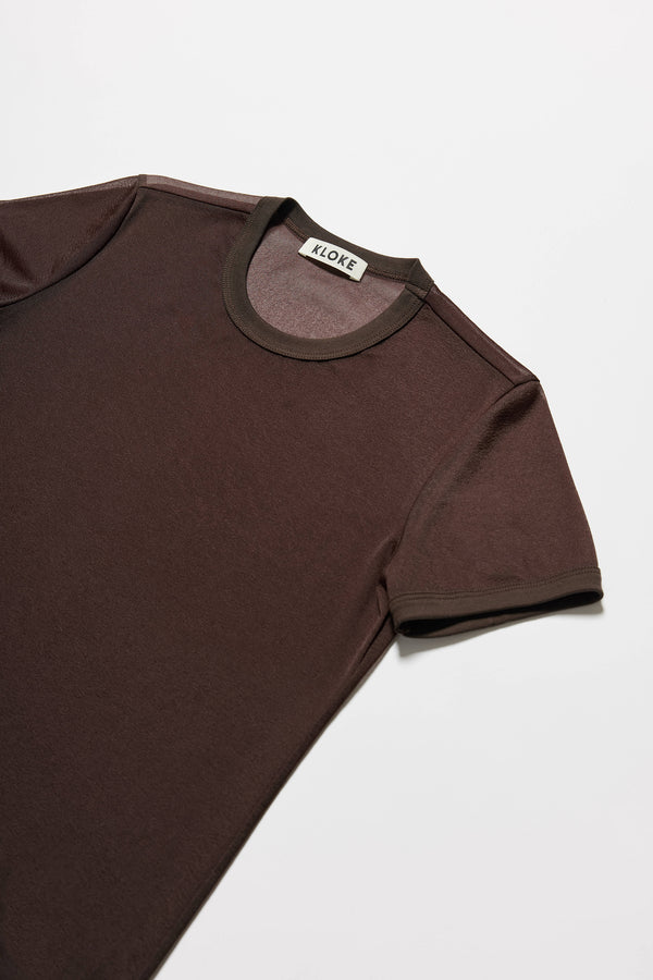 Close-up of ribbed binding at neckline and armholes. The Ethereal Tee in Brown 