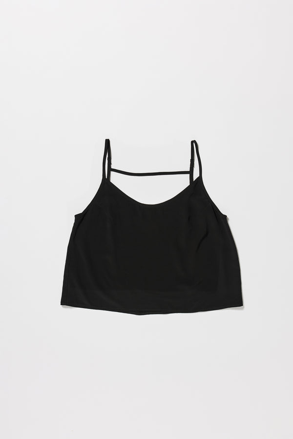 Flat front view of black Viscose rayon Evolve Top with adjustable straps and fluid drape