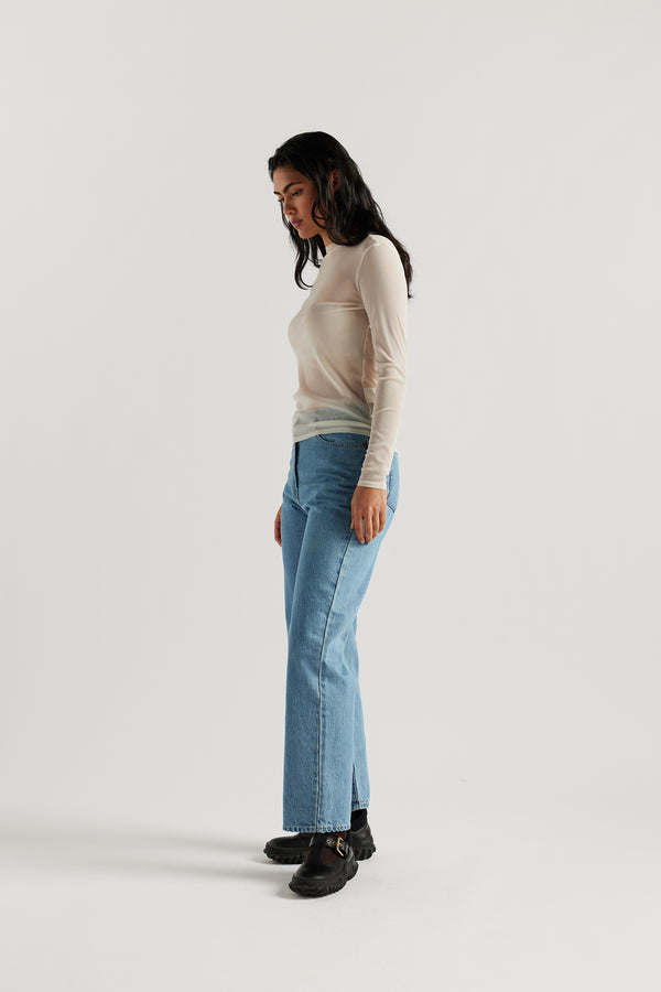 Front Angle of Female Model wearing the Ecru Exist Top in sheer Japanese power-mesh with a clean, fitted silhouette. 