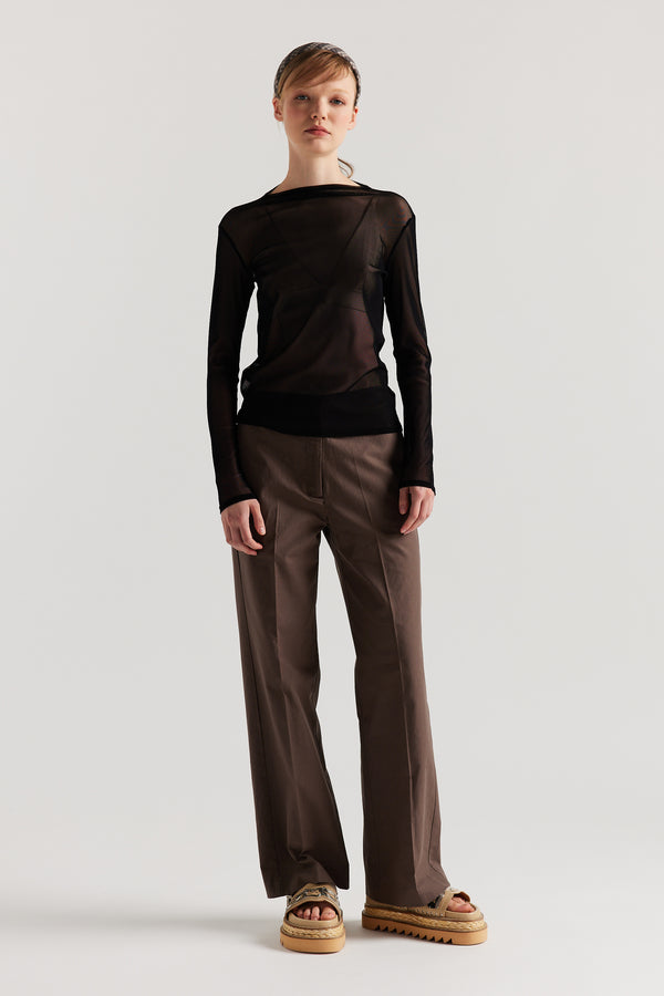 Front of Model wearing the Jet Black Exist Top in sheer Japanese power-mesh with a clean, fitted silhouette. 