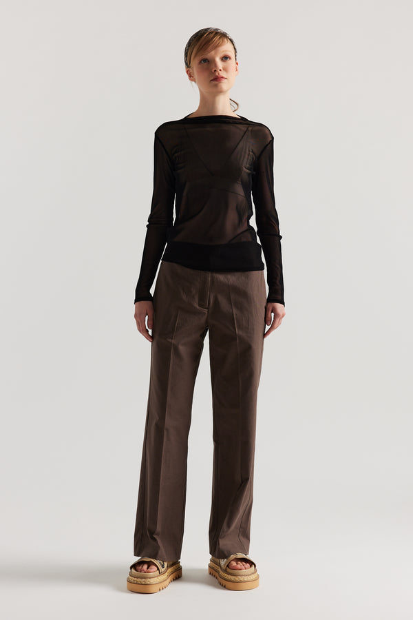 Front of Model wearing the Jet Black Exist Top in sheer Japanese power-mesh with a clean, fitted silhouette. 