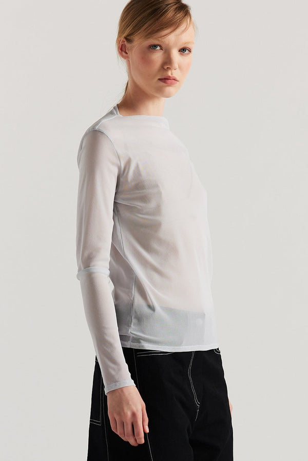 Front of Model wearing the Pale Blue Exist Top in sheer Japanese power-mesh with a clean, fitted silhouette. 