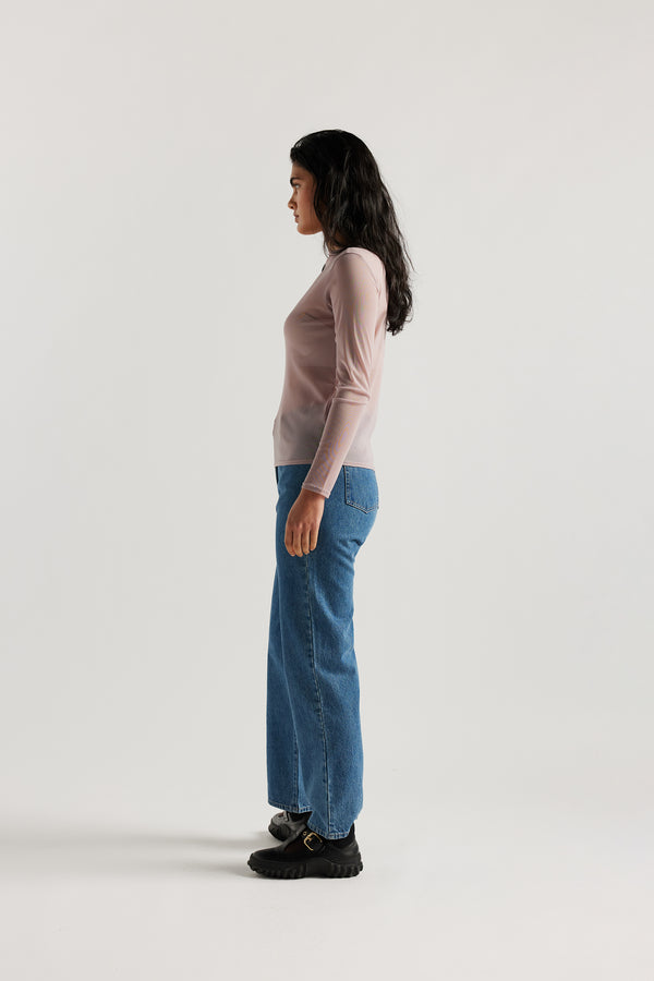 Side of Female Model wearing the Mauve Exist Top in sheer Japanese power-mesh with a clean, fitted silhouette. 