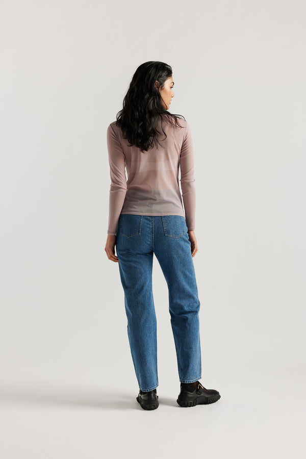 Back of Female Model wearing the Mauve Exist Top in sheer Japanese power-mesh with a clean, fitted silhouette. 