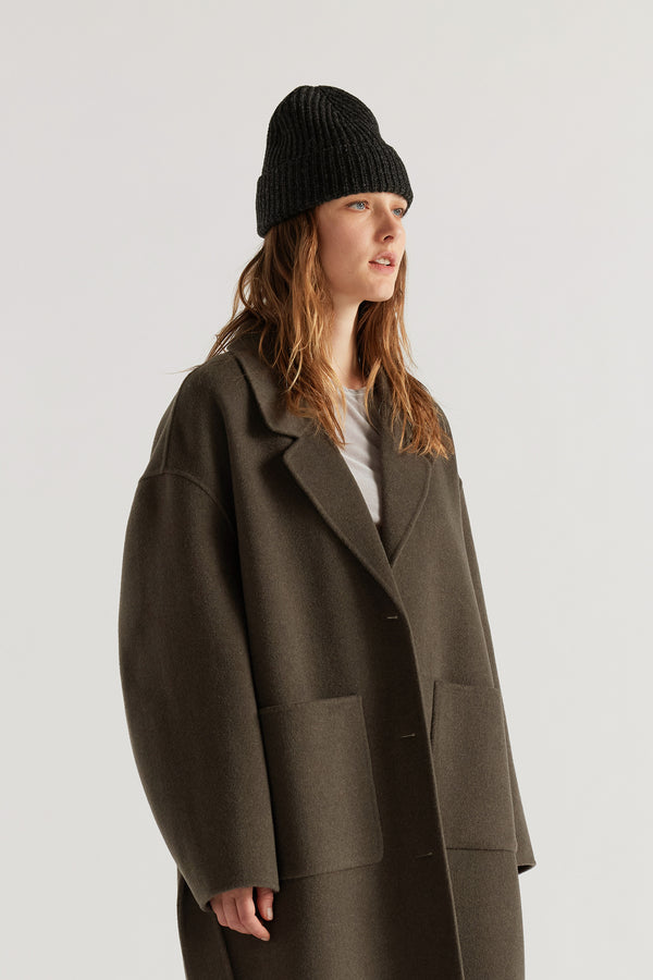 Women - Charcoal Fading Beanie worn on model, showing contemporary shape and ribbed half-cardigan knit construction in RWS certified Merino