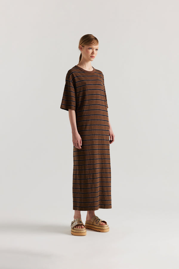 Front of Model in the Brown/Black/Lilac Fidelity Dress in cotton slub with relaxed loose fit and feeder stripe