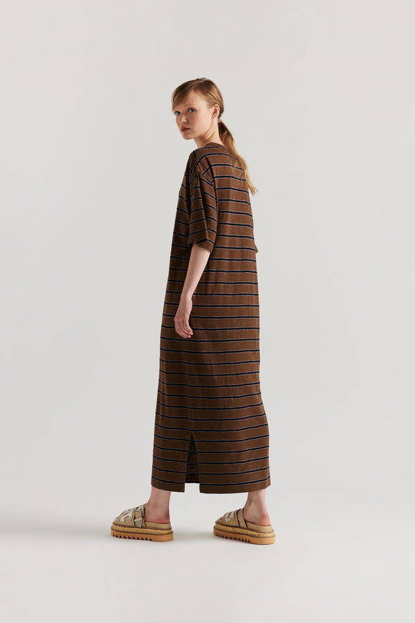 Back of Model in the Brown/Black/Lilac Fidelity Dress in cotton slub with relaxed loose fit and feeder stripe