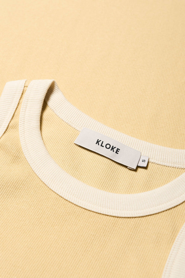 Close-up of the Japanese ribbed cotton fabric of the Kloke Flux Racer Back Tank. Available In 5 sizes. 