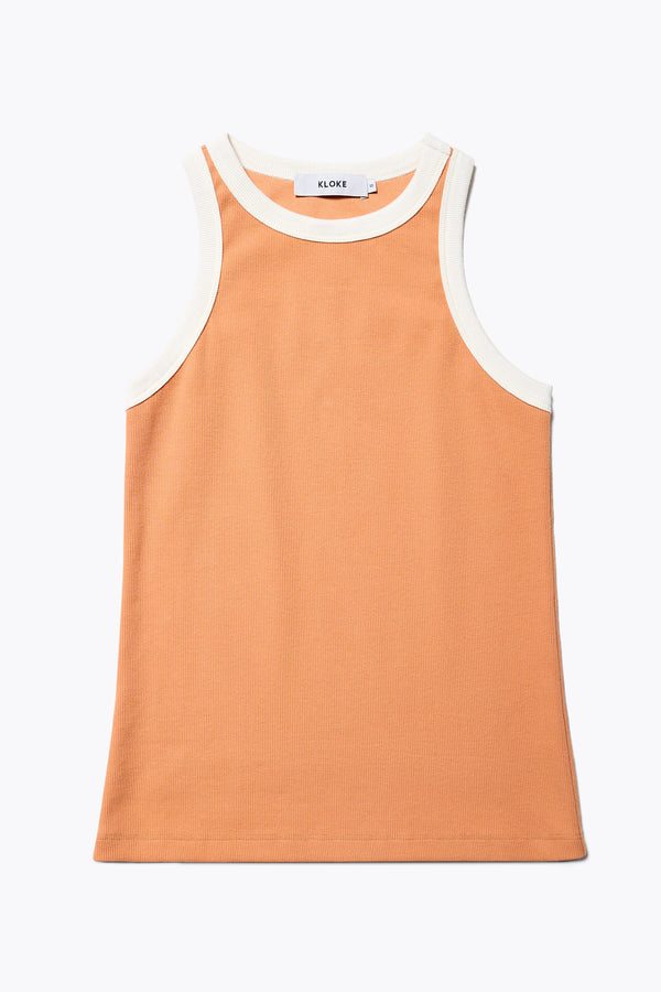 Flat Front of Kloke Flux Racer Back Tank in Pastel Orange and Ecru Japanese ribbed cotton, featuring a slim fit and slight racer neckline, perfect for layering. Available in 5 sizes. 