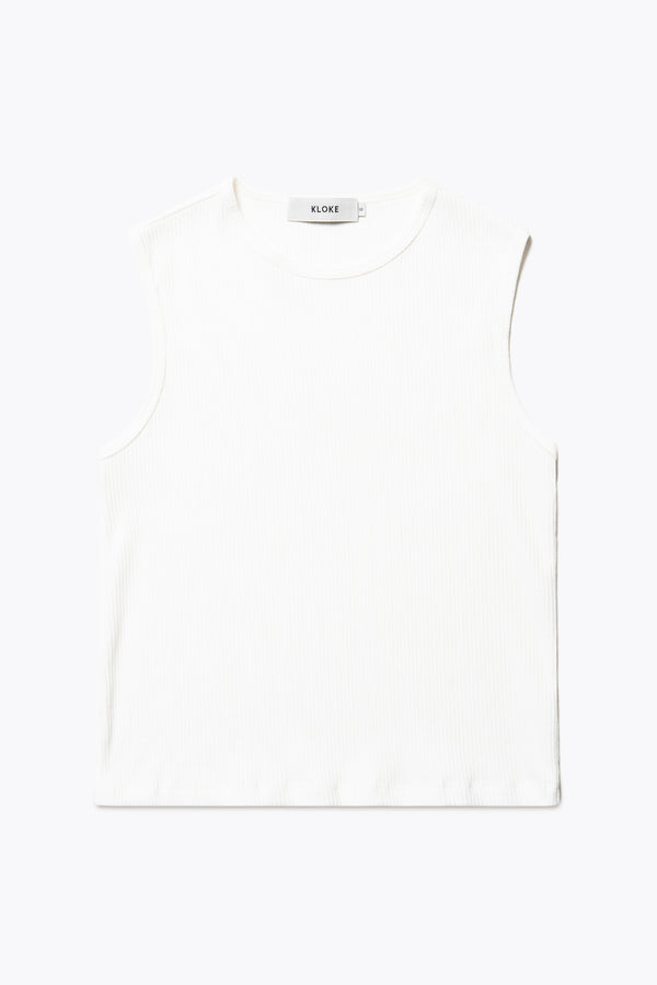 Flat Front of the Hillside Tank in Off White, a slim-fitting crew neck top in fine Japanese rib knit, featuring a sleek, minimalist design