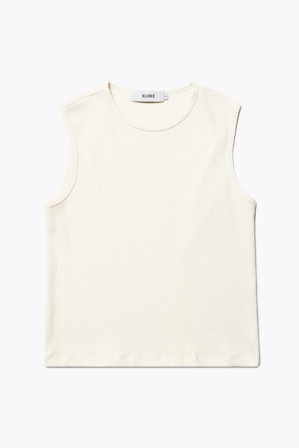 Flat Front of the Hillside Tank in Pale Yellow, a slim-fitting crew neck top in fine Japanese rib knit, featuring a sleek, minimalist design