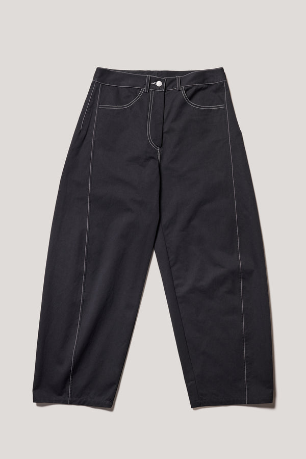 Flat front of the Initial dart pant in black, a tailored cotton style in sand with contrast-stitch front seam panelling.