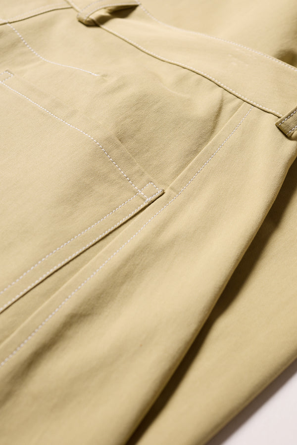 Close-up of contrast stitching + Fabric of the sand Initial Dart Pant