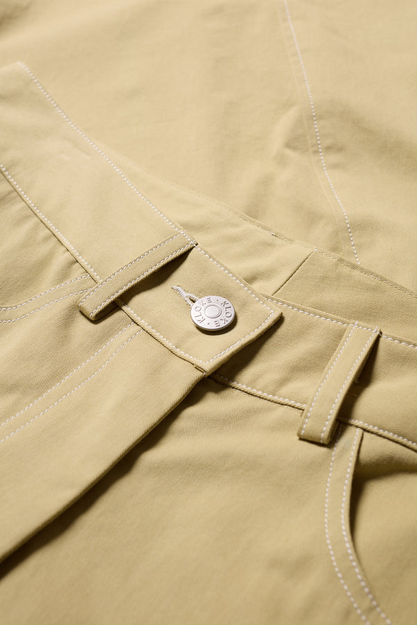 Close-up of contrast stitching + Fabric of the sand Initial Dart Pant