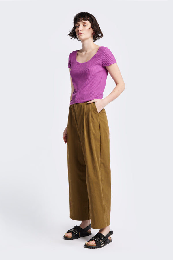 The Interim Pant in Olive Brown, Tailored wide-leg in premium cotton with double-front pleats, side slant pockets, jet back pockets, and a hook-and-bar closure. Available in 6 sizes.