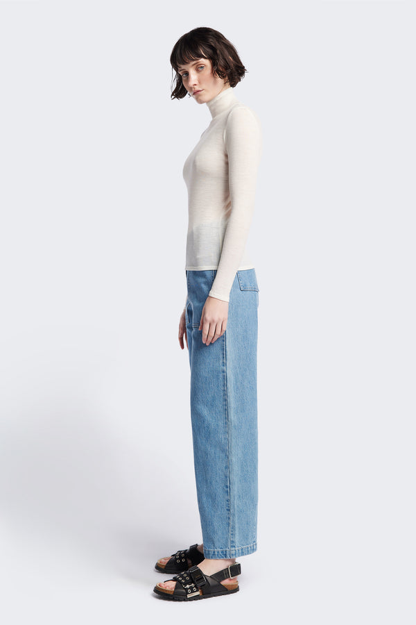 Side of The Interval Jean in Pale Wash. A well-loved Kloke classic. A straight, wide leg with higher rise waist, back yoke detail, and feature patch pockets. Crafted from premium 12oz Japanese denim.