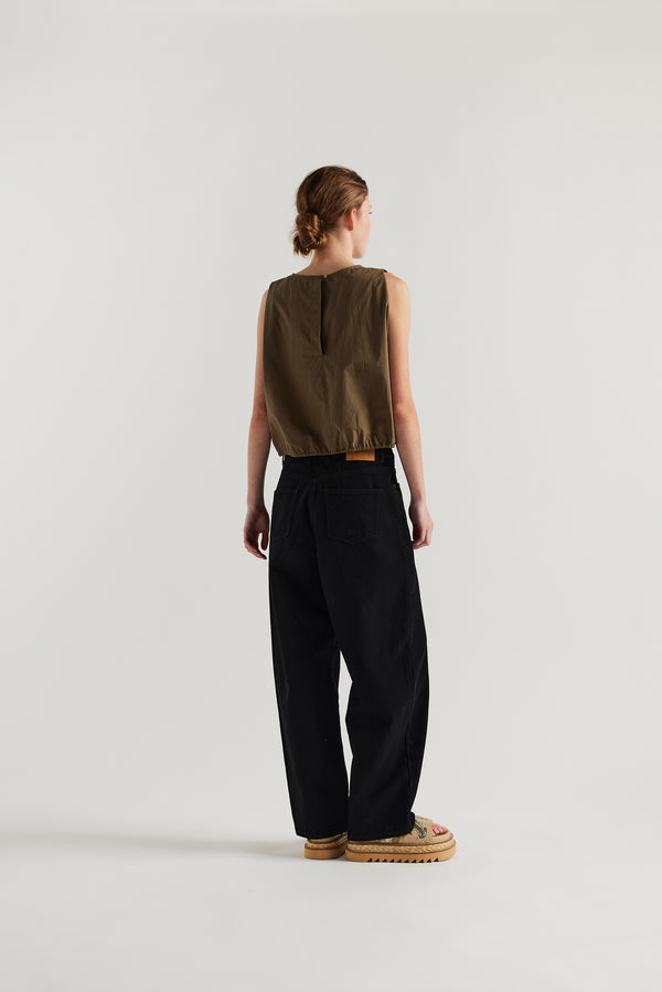 Back  view of female model in the Olive Lambent Top front view showing round neckline and centre-front seam detail
