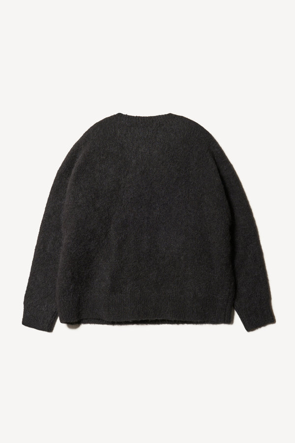 Flat Back view of alpaca blend Laurel Crew Neck Knit Sweater in black  