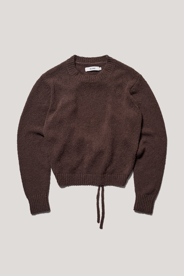 Flat front of the brown Levity Tie Top with open back and adjustable tubular ties in soft cotton–nylon knit