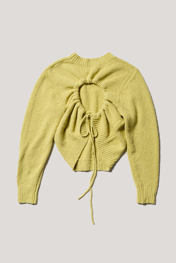Flat back of the yellow Levity Tie Top with open back and adjustable tubular ties in soft cotton–nylon knit