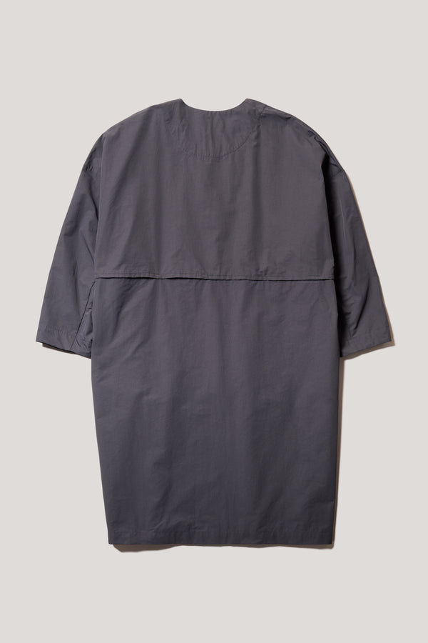 Flat Back view of the Stone Locate Jacket, with centre-front button closure and rounded neckline.