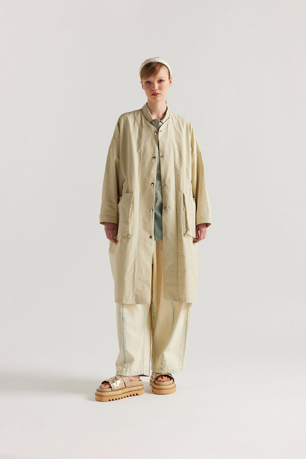 Front view of the Stone Locate Jacket on model with centre-front button closure and rounded neckline.