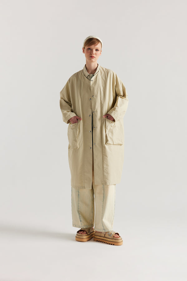 Front view of the Stone Locate Jacket on model with centre-front button closure and rounded neckline.