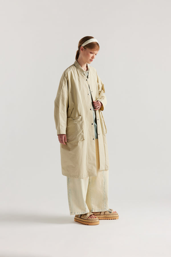 Front view of the Stone Locate Jacket on model with centre-front button closure and rounded neckline.