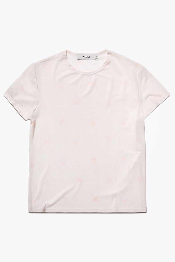 The Mica Short Sleeve Mesh Top in Floral Ecru, lightweight and soft with just the right amount of stretch. Available in 6 sizes