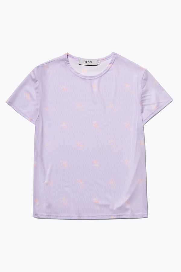 The Mica Short Sleeve Mesh Top in Lilac Floral, lightweight and soft with just the right amount of stretch. Available in 6 sizes