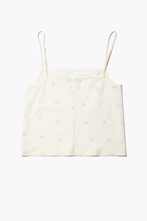 Flat Back of The Minaret Cami in Ecru Floral, a bias-cut camisole with adjustable thin straps, a rounded scoop neckline, and a straight back, made from textured seersucker cotton. Available in 5 sizes. 